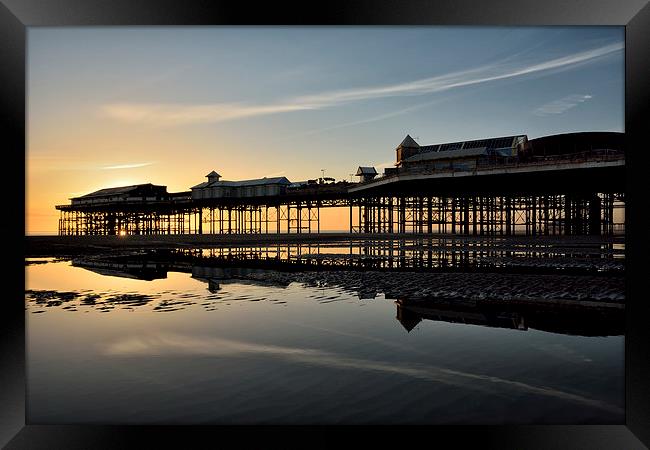 Sunset North Pier Reflections Framed Print by Gary Kenyon