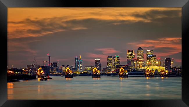 River Thames with Canary Wharf and O2 in the backg Framed Print by John Ly