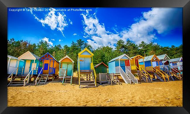 Coloured Beach Huts  Framed Print by Chris Thaxter