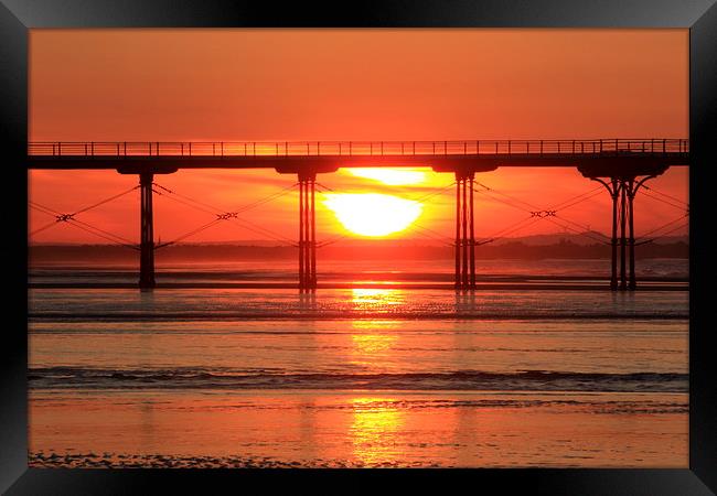 Pier At Sunset Framed Print by Kerri Dowling
