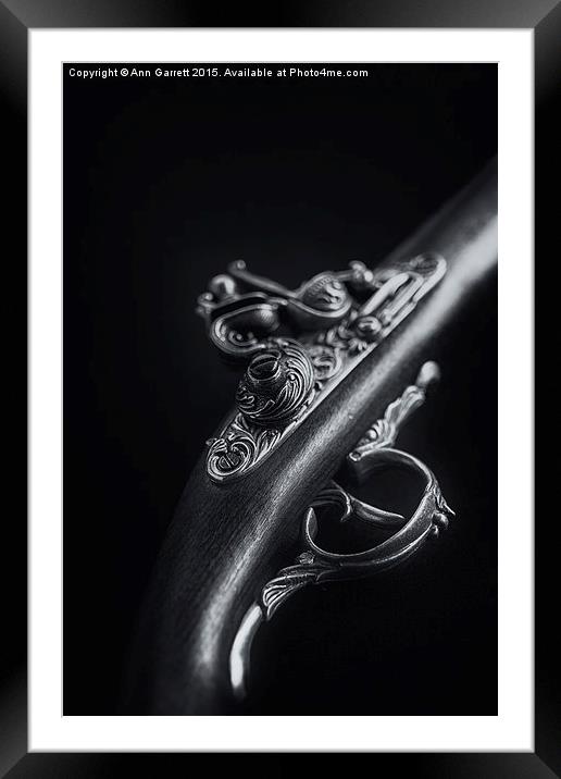 The Pistol Framed Mounted Print by Ann Garrett