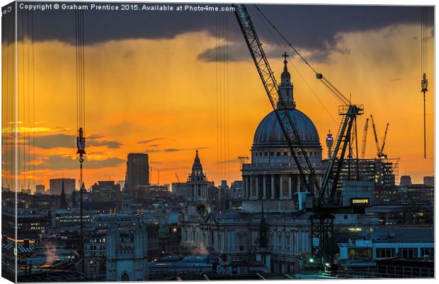 Sunset over St Paul's Cathedral with cranes Canvas Print by Graham Prentice