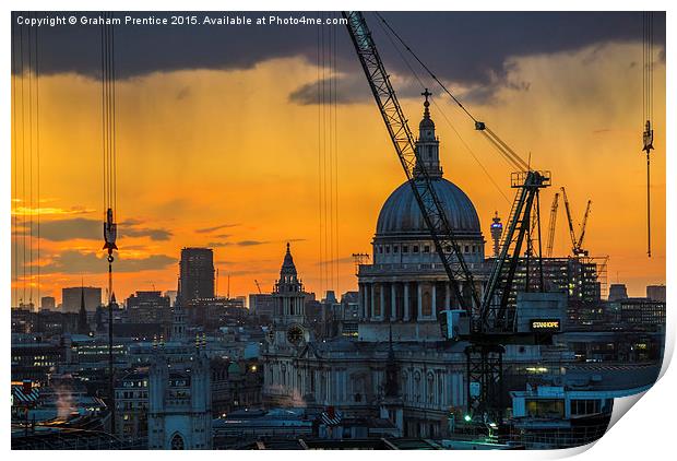 Sunset over St Paul's Cathedral with cranes Print by Graham Prentice