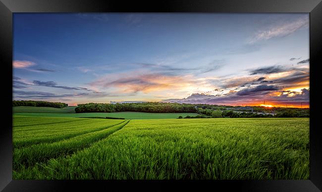 Sunset on Wheatfields in Kent Framed Print by John Ly