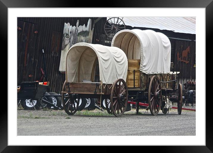 The Covered Wagons Framed Mounted Print by Irina Walker