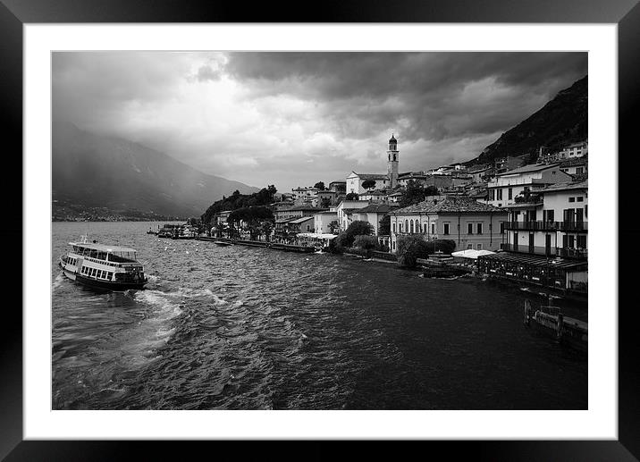 Lake Garda during the rain  Framed Mounted Print by Jonathan Evans