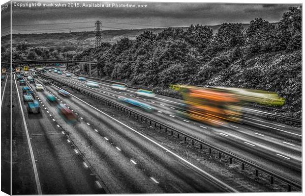  A Rush Hour Flash of Colour Canvas Print by mark sykes