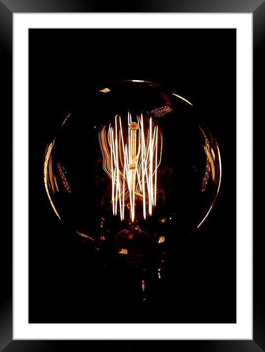 inside the lightbulb Framed Mounted Print by Heather Newton
