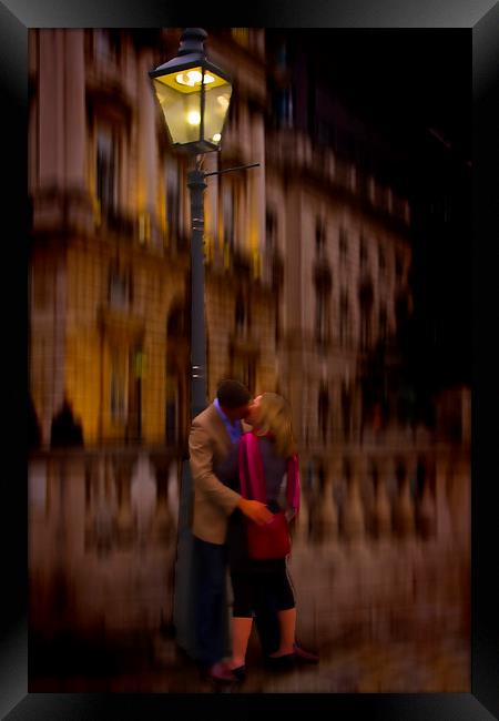 A Kiss Under the Lamp light Framed Print by David French