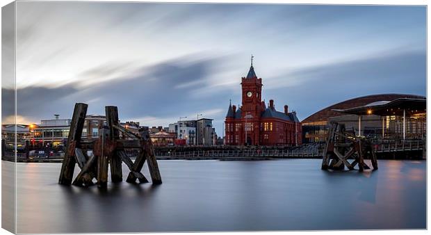  Pierhead Building from across the bay, Cardiff Canvas Print by Dean Merry
