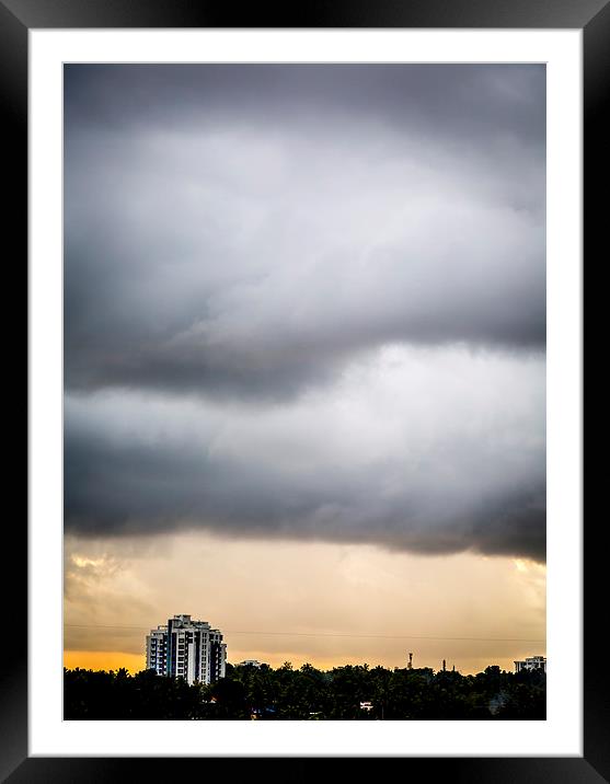 Rain Clouds Framed Mounted Print by Hassan Najmy