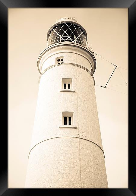   Nash point Lighthouse Framed Print by Dean Merry