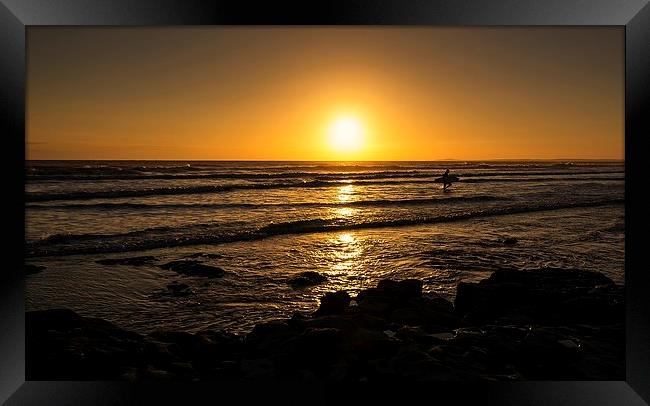 Surf sunset silhouette  Framed Print by Dean Merry