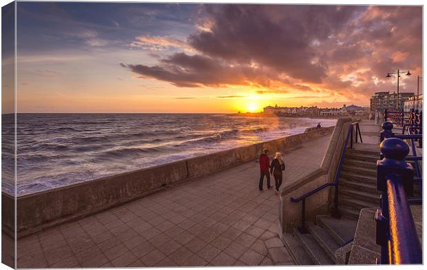   Couple enjoying the Porthcawl sunset Canvas Print by Dean Merry