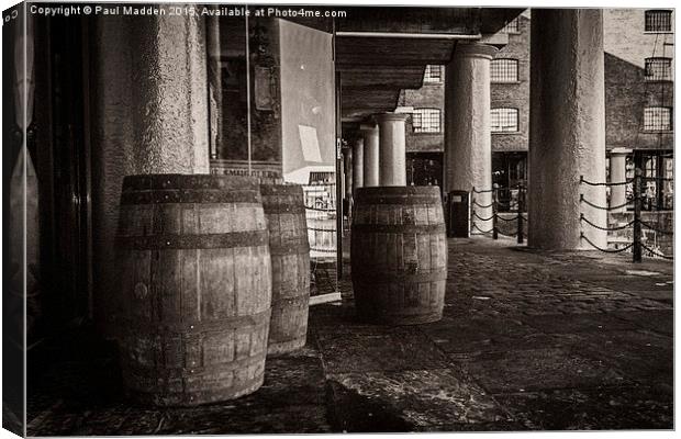 Barrels at the dock  Canvas Print by Paul Madden