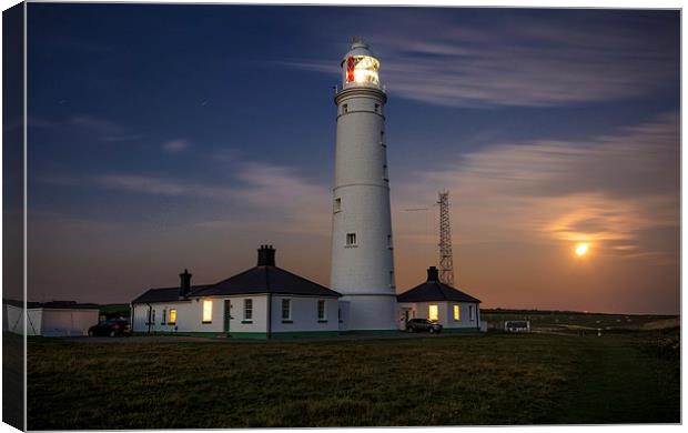 Nash point Lighthouse Canvas Print by Dean Merry