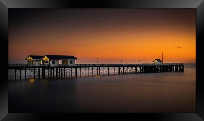  Sunrise glow at Penarth Pier Framed Print by Dean Merry