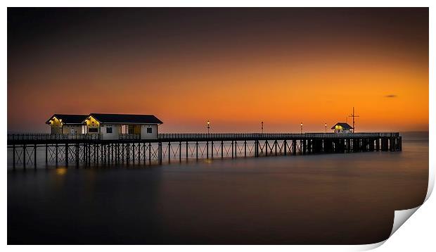 Sunrise glow at Penarth Pier Print by Dean Merry