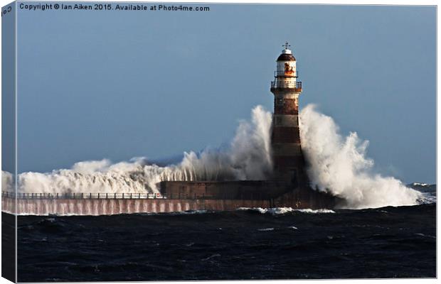  Roker Pier Lighthouse on a Stormy Day Canvas Print by Ian Aiken