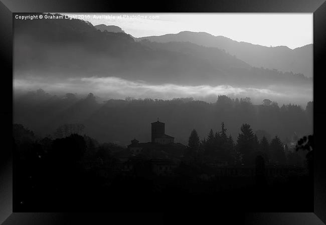  Early morning mist in the Sercio vally and Appeni Framed Print by Graham Light