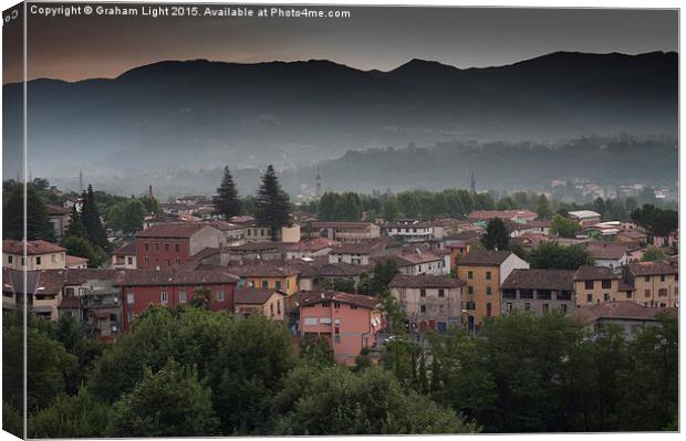 Early morning mist in the Sercio valley and Appeni Canvas Print by Graham Light