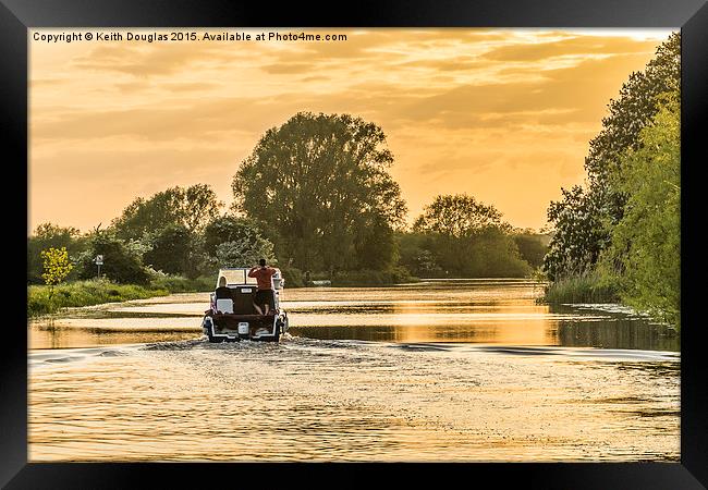 Evening cruise on the river Framed Print by Keith Douglas