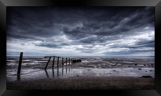  A moody day at the beach. Framed Print by John Ly