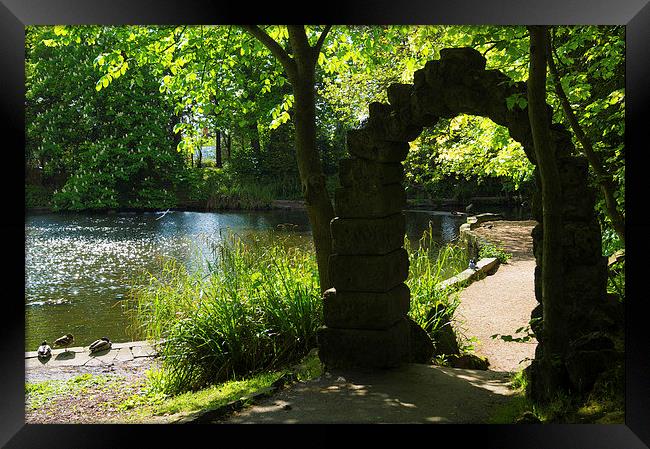  archway by the lake Framed Print by michael swords