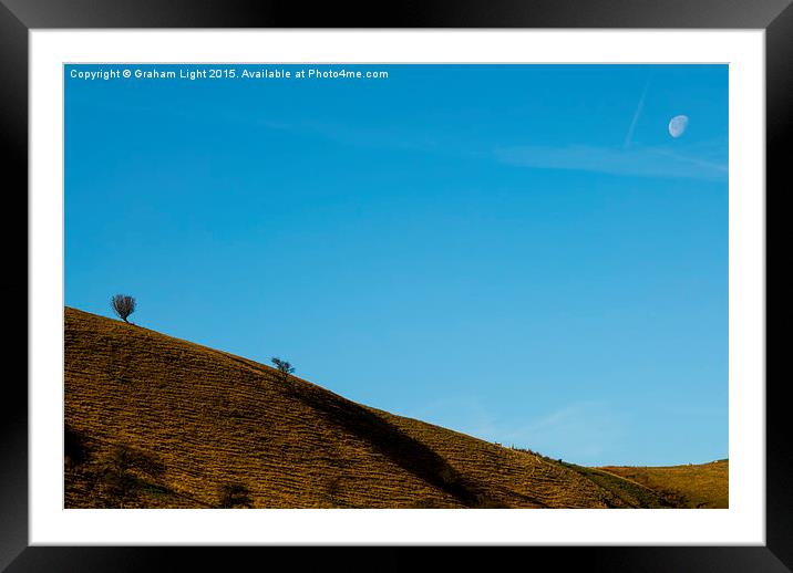  Barren landscape in the Peak district watched ove Framed Mounted Print by Graham Light