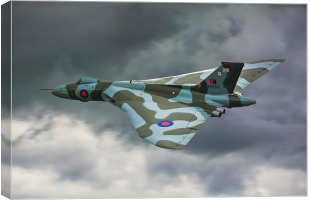 ARVO Vulcan XH558 flying low in moody skies over  Canvas Print by Andrew Scott