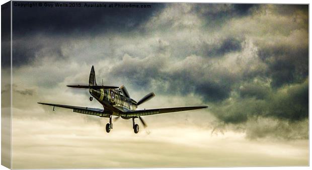 Spitfire On Final Approach. Canvas Print by Guy Wells