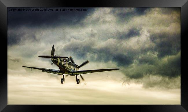 Spitfire On Final Approach. Framed Print by Guy Wells