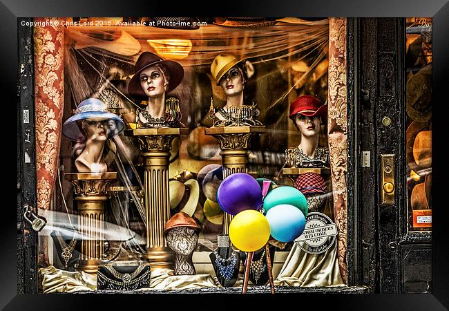 The Lady's Hat Shop Framed Print by Chris Lord