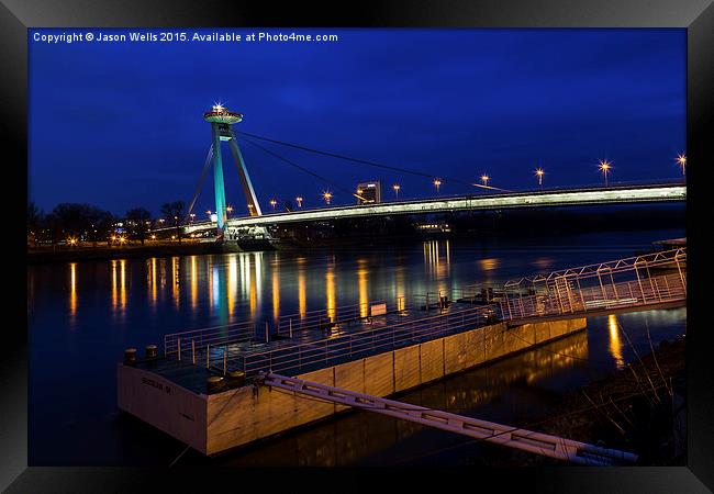 Reflections of the UFO Bridge during the blue hour Framed Print by Jason Wells