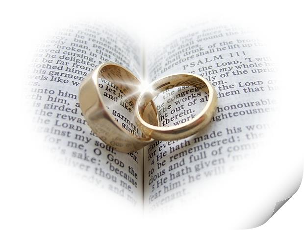 Wedding rings on an open Bible Print by Pete Holloway