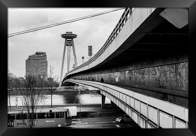 Looking alongside the UFO Bridge during the day Framed Print by Jason Wells