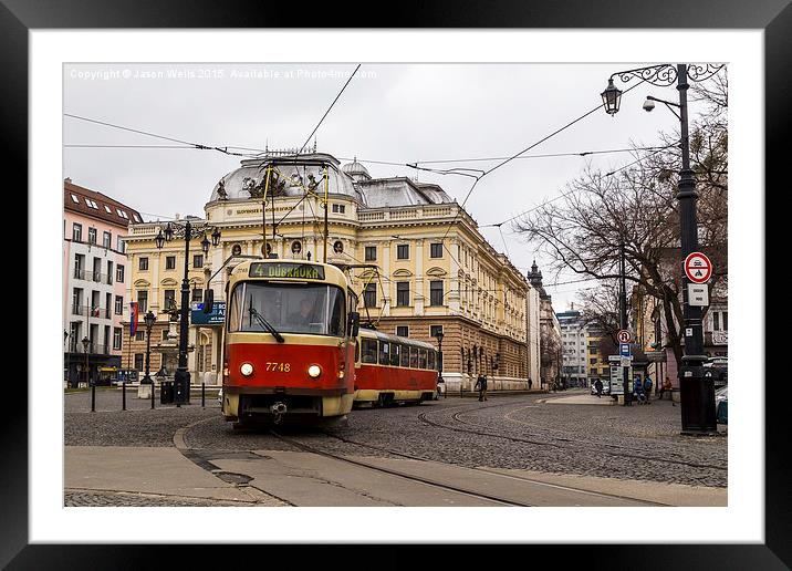Tram in front of the Slovak national theatre Framed Mounted Print by Jason Wells