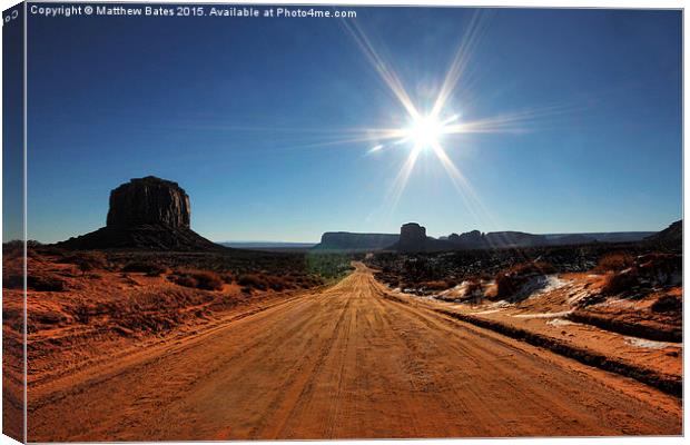  Monument Valley sun flare Canvas Print by Matthew Bates