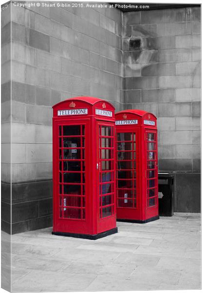  Two Traditional Red Telephone Boxes Canvas Print by Stuart Giblin