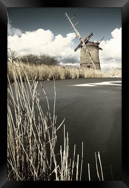 Brograve Mill by a frozen river Framed Print by Stephen Mole