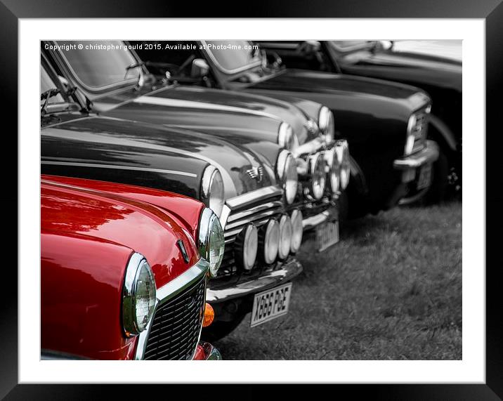  A red mini with others Framed Mounted Print by christopher gould