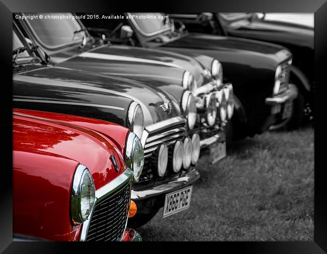  A red mini with others Framed Print by christopher gould