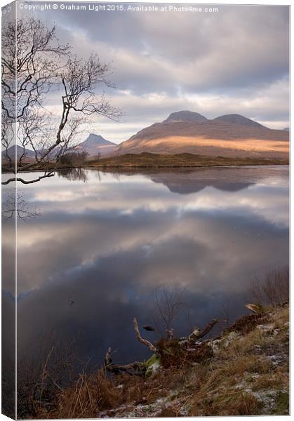 Reflections across the Loch Canvas Print by Graham Light