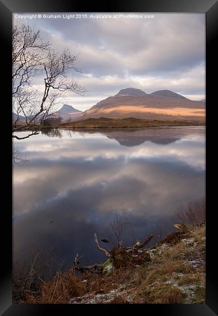 Reflections across the Loch Framed Print by Graham Light