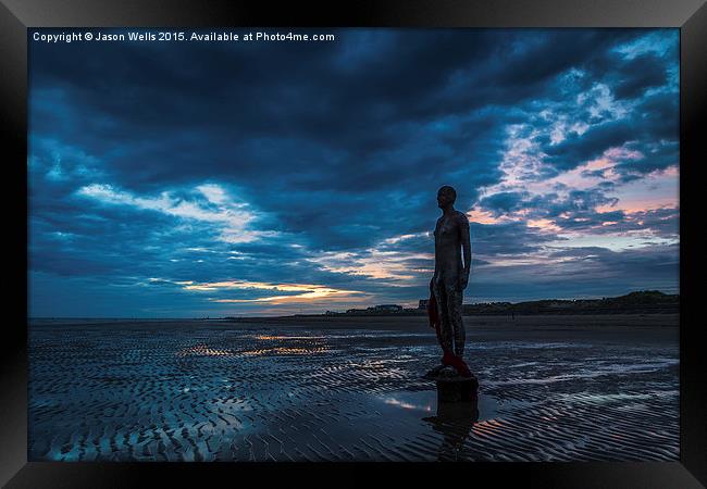 Colourful sky above the Iron Men at Crosby Framed Print by Jason Wells