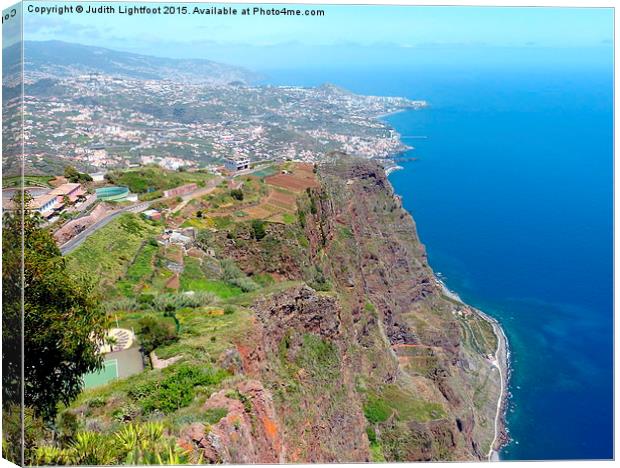 Overview of Funchal coastline from above  Canvas Print by Judith Lightfoot
