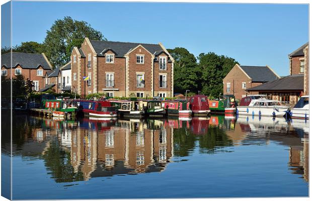 Reflections on the canal Canvas Print by Gary Kenyon