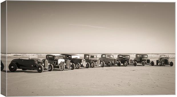  Hot rods on the beach Canvas Print by Dean Merry