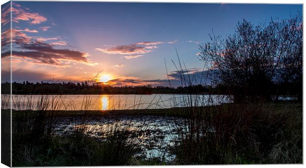  sunset over lake Canvas Print by Paul Burrows