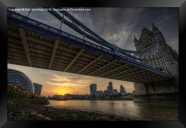  London skyline from under Tower Bridge at sunset Framed Print by Dan Hamilton